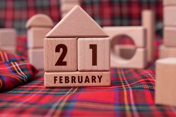 February 21 written with wooden blocks