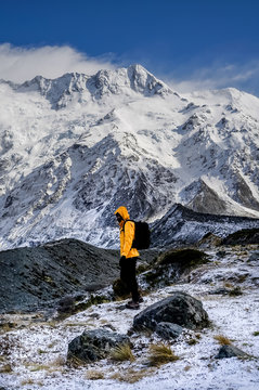 A man hiking in snow mountain.Hiking the Hooker Valley track in Mount Cook,New Zealand.