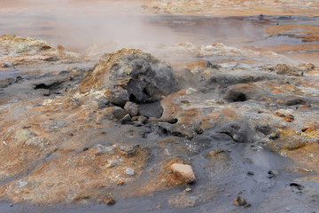Hot mud pots in the Geothermal Area Hverir in Iceland. Europe