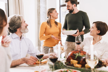 Happy big family celebrating Christmas together at home