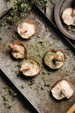 Overhead view of fresh shiitake mushrooms in tray