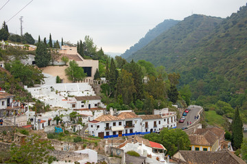 Fototapeta na wymiar Sacromonte village famous for its houses made in caves at the hill slopes, Granada, Spain