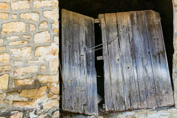 old Old wooden gate near the house in the Cypriot village.