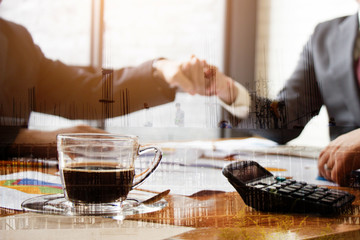 Business handshake Between manager to further invest in the future.