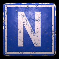 Public road sign in blue color with a capitol white letter N in the center isolated black background. 3d