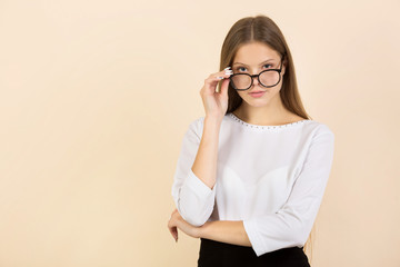 beautiful young woman on beige background