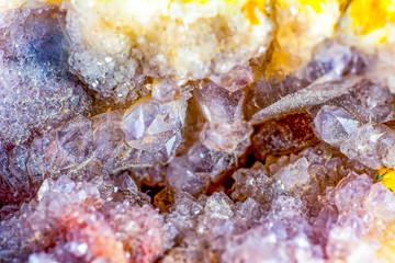 Macro of natural mineral rock on white background close up