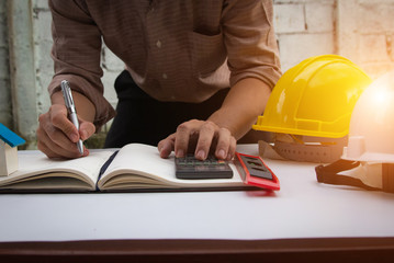 architect working on blueprints