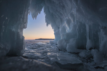 inside of cave in baikal lake at sunset