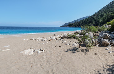 Fototapeta na wymiar Panorama of the sunny sandy paradise beach