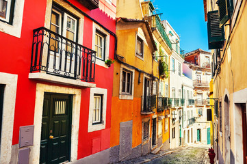Fototapeta na wymiar Colorful architecture in Lisbon, Portugal. View of the hills in Old town. Famous travel destination