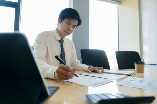 Businessman analyse investment marketing data.