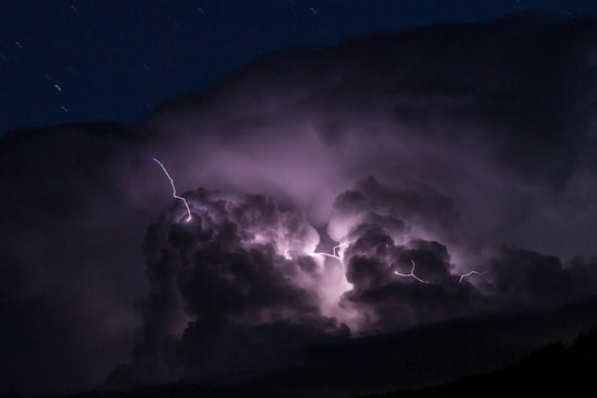 Lightning breaks through a storm cloud in southwest Colorado.