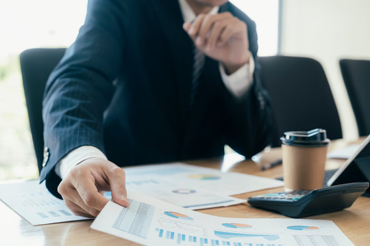 Businessman analyse investment marketing data.