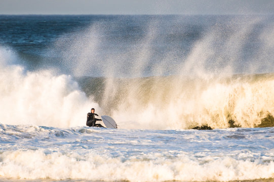 Failing to catch big waves at sunset