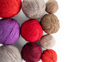 Balls of yarn in various colors. Isolated on a white background.