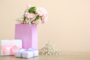 flowers and gifts on the table. March 8 concept, mother's day, womens day, birthday.