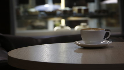 cup on wooden table