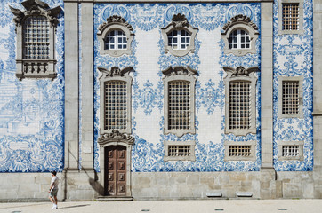 Awesome facade of the Carmo church with many Azulejos in Porto