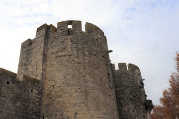 Fototapeta na wymiar Entrée des remparts de la ville fortifiée de Aigues Mortes - Département du Gard - Région Occitanie - France