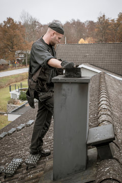 Chimney Sweep cleaning chimney