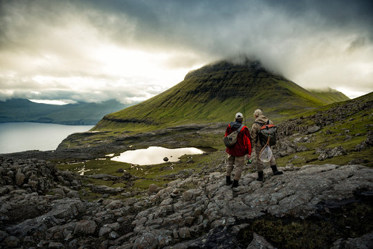 Hikers at mountain lake