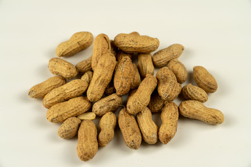 pile of peanuts isolated on white background