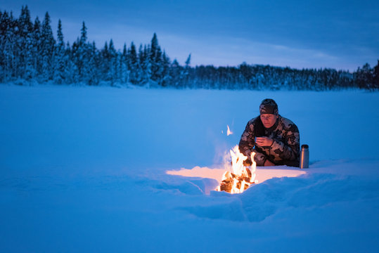 Woman camping at winter