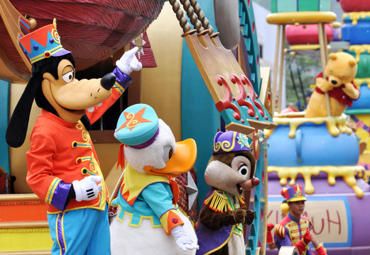 HONG KONG - DEC 2015: Parade in Disneyland with famous cartoon characters in Hong Kong on November 2015 in China