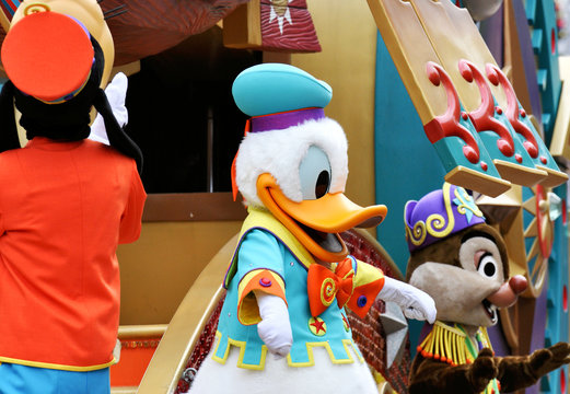 HONG KONG - DEC 2015: Parade in Disneyland with famous cartoon characters in Hong Kong on November 2015 in China