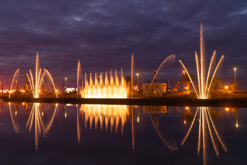 Fototapeta na wymiar Beautiful fountain at sunset day on exposure in the city of Batumi, Georgia.