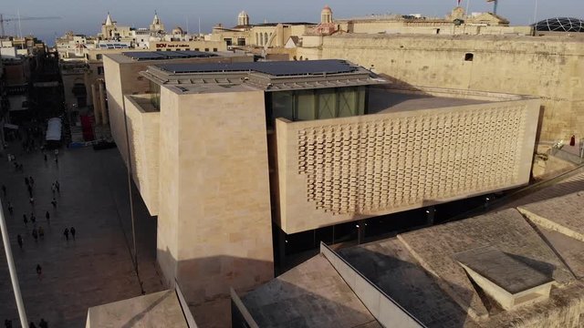 Aerial Drone shot of the New Parliament House, Main City Gate and Freedom Square in Valletta, Malta