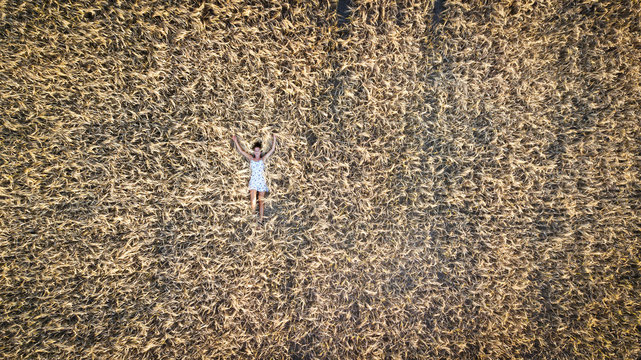 Woman on wheat field