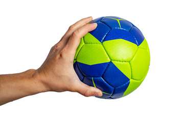Handball ball in hand closeup on a white background