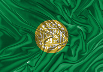 Rohingya flag waving in the wind. Flag of the Rohingya as a patriotic background. Close up