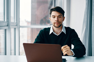 businessman working on laptop in office