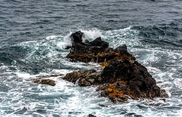 Crashing waves along the Atlantic coastline at Mosteiros Azores Portugal