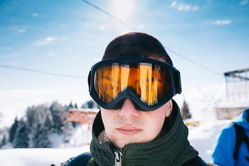 Fototapeta na wymiar Portrait Of Skier Wearing His Goggles