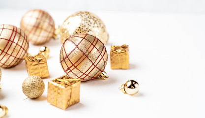 golden christmas balls on white background, christmas card