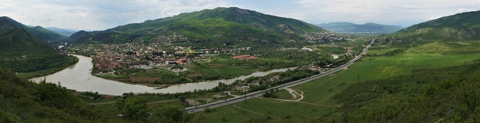 panoramic top view of the Kura and Aragvi rivers and Mtskheta in Georgia on a summer day © Sergey