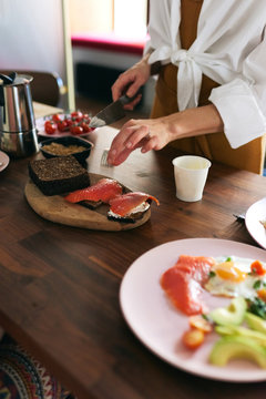 Mom Cooking Salmon Sandwiches