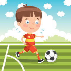 Obraz na płótnie Canvas Little Child Playing Football Outside