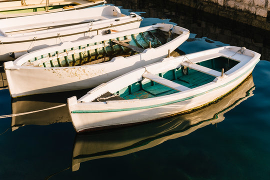 Boat tied to dock