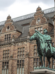 Fototapeta na wymiar Stockholm Sweden copper statue of solider on horse leading troops