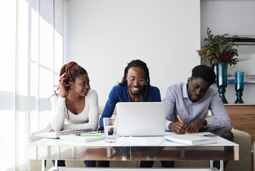 Black afro friends studying.