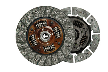 new car transmission clutch disc and used side by side on a white background