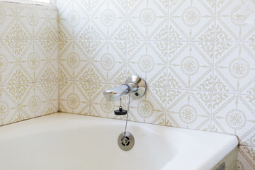 Vintage Bathroom with white and green tiles