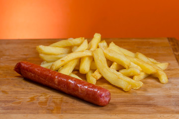 Take-Away foods on Orange vibrant background colour and wood