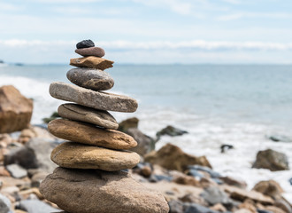 Balansed Stacked stones on the beach