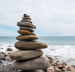 Balansed Stacked stones on the beach